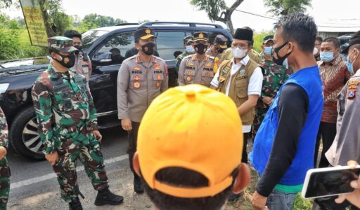 Polda Jatim Kerahkan Pasukan di Zona Merah Bangkalan Cegah Penyebaran Covid-19